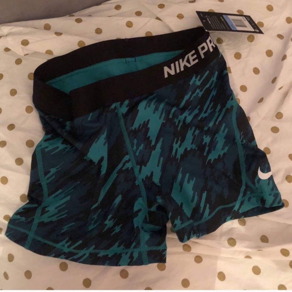 Green and blue nike pros